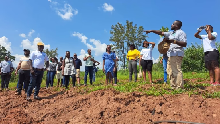 Members at the Mairye land visit: land site visit 04