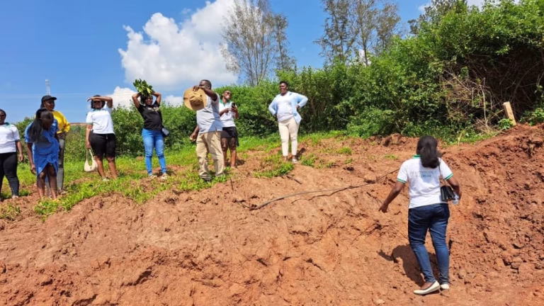 Members at the Mairye land visit: land site visit 06